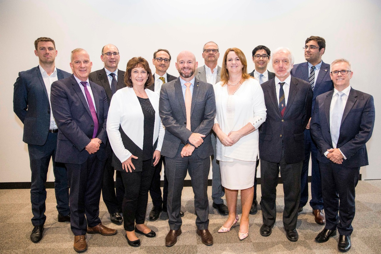 Minister Niall Blair with representatives from GE Additive and the University of Sydney.
