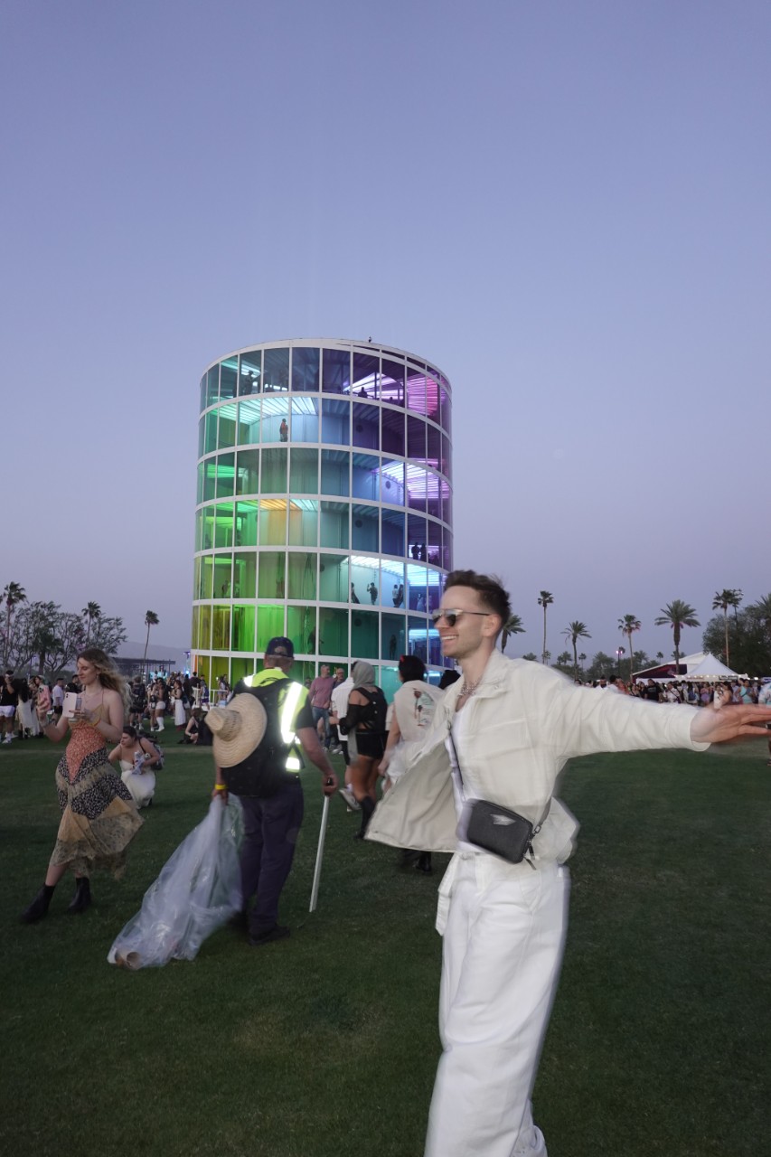 Pasha smiling and walking freely at music festival