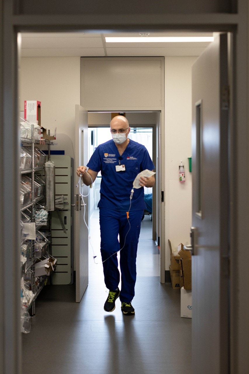 Ramon Shaban walking through hospital corridor