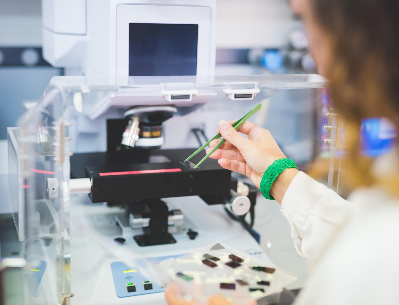 infrared spectroscopy machine with person and tweezers