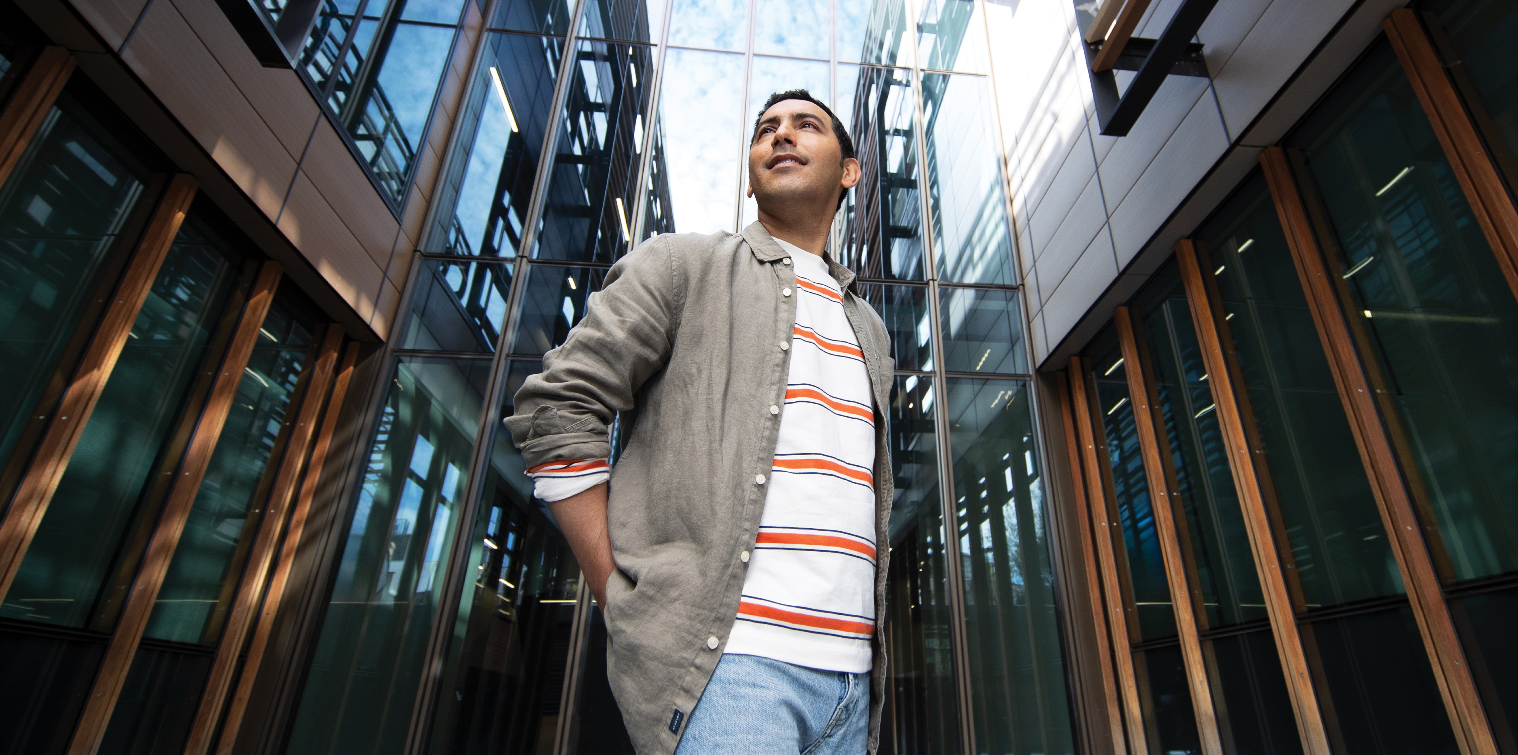 Image of Yaser in front of the business school