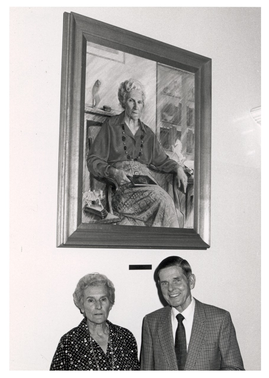 Ann Macintosh with artist Stuart Maxwell and the portrait he painted of her
