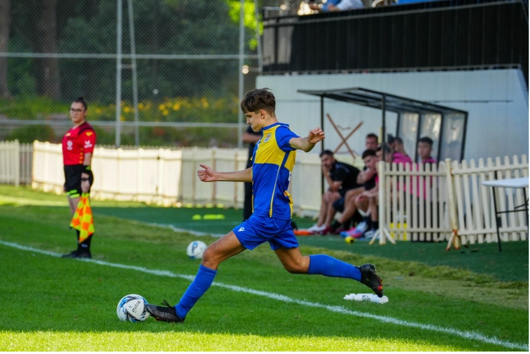 Yanni Plataniotis playing football