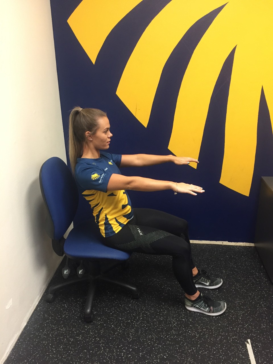 Person doing seated core holds