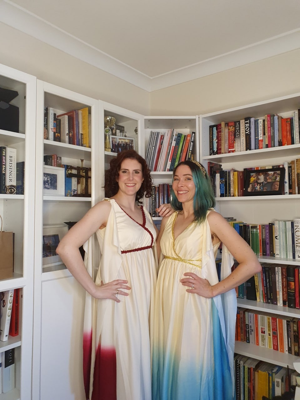 Dr Peta Greenfield and Dr Fiona Radford standing in front of book shelf