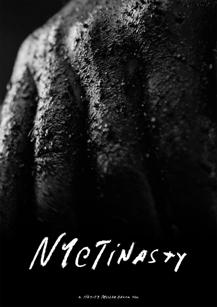 a poster image of a muddied hand in drastic blacks