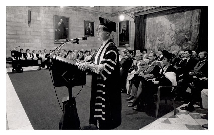 Archive photo of Dame Leonie Kramer in Great Hall welcoming new students in 1991.