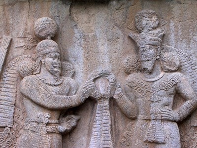 Ardishir receives the 'ring of kingship' from the god Ahura. Relief from Taq-i Bistun, Iran.
