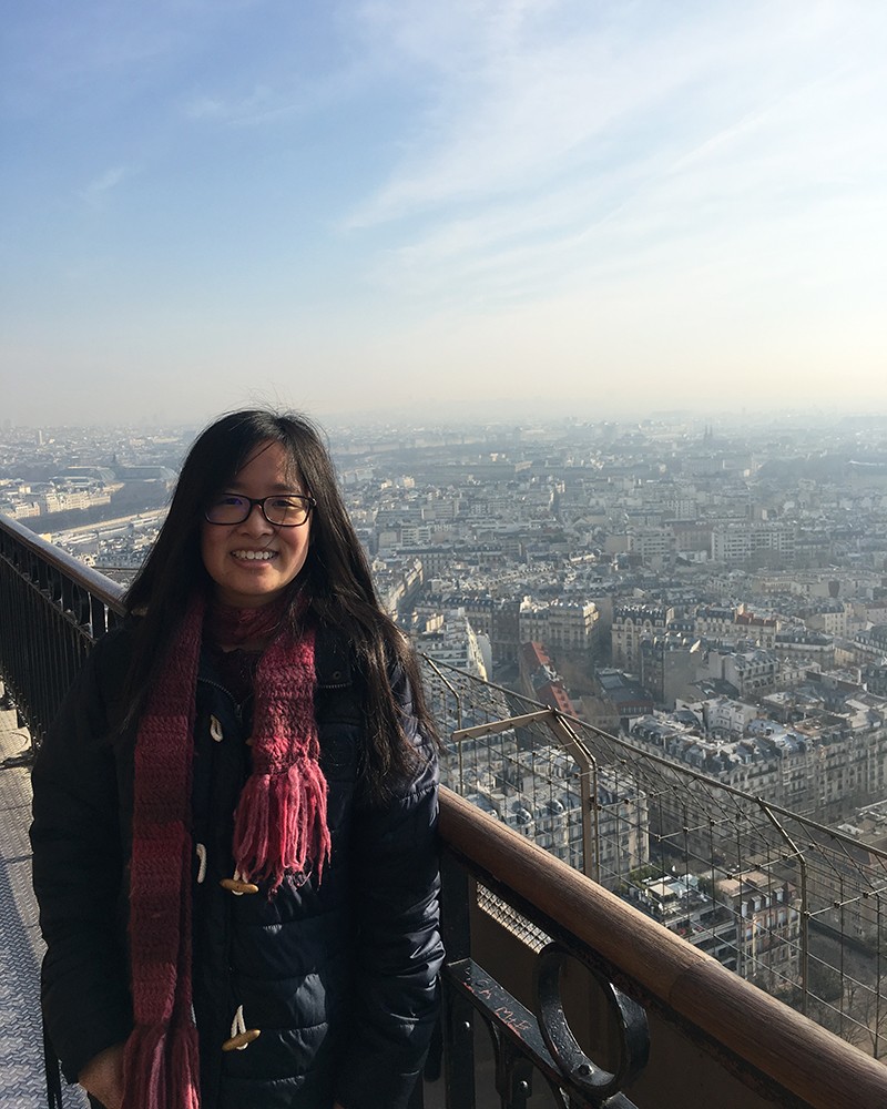 Marina on the rooftop overlooking the city of Paris, France