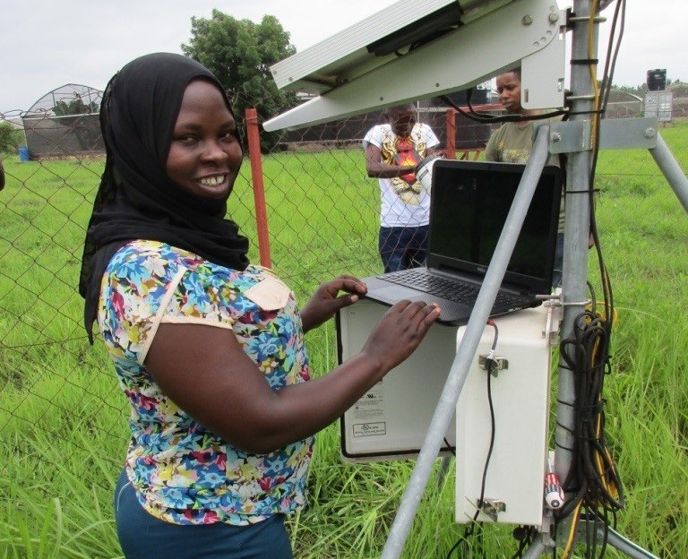 Ms Fatuma Matwewe collecting weather data in Kilombero District