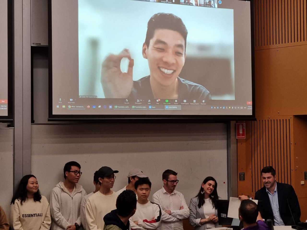 Students presenting in person and over Zoom