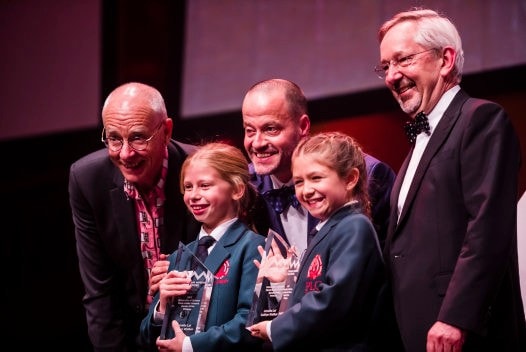 2017 Sleek Geeks Science Eureka Prize primary school winners on stage holding awards