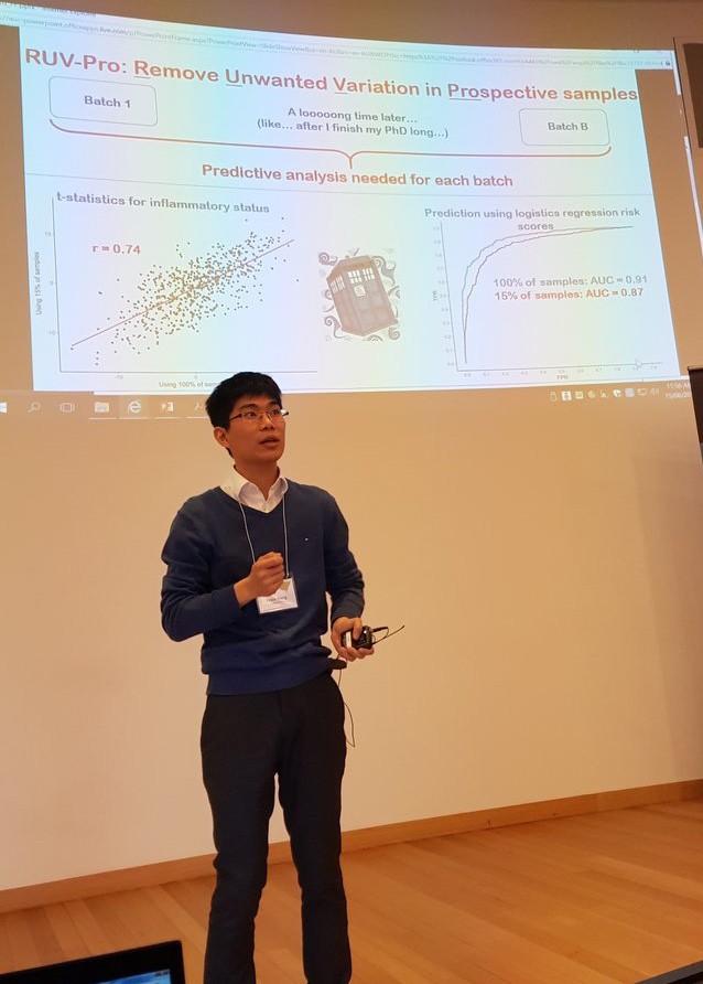 Kevin Wang presenting his research at a conference