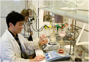 Photo of student working in the Synthetic Chemistry Laboratory