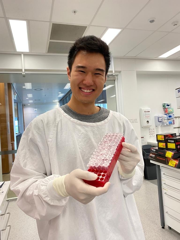 Student Jett Ho conducting research in the lab