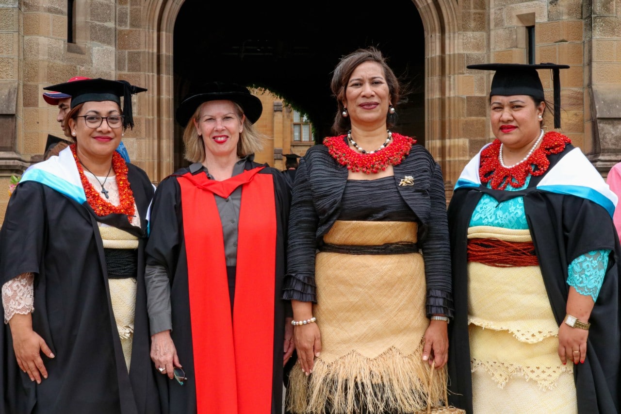 Head of School and Dean, Professor Donna Waters stands with Dr Amelia Tu’ipulotu and Lenity scholars Aspasia Vaka and Meleane Siale at Sydney's nursing graduation ceremony.