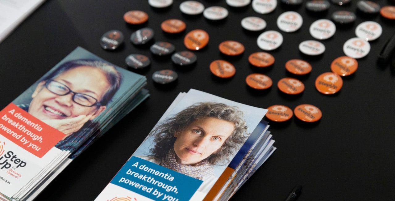 Step up for dementia promotional resources laid on table