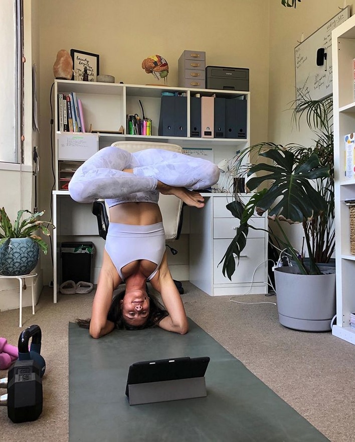 Medical student practicing yoga.