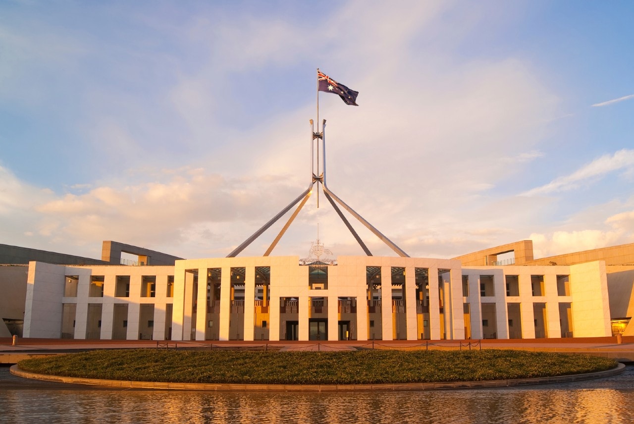 Parliament House in Canberra, Australia, at sunset.