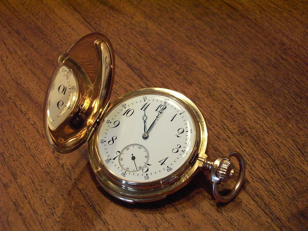 Stock image of pocket watch. Image: Wikimedia Commons.