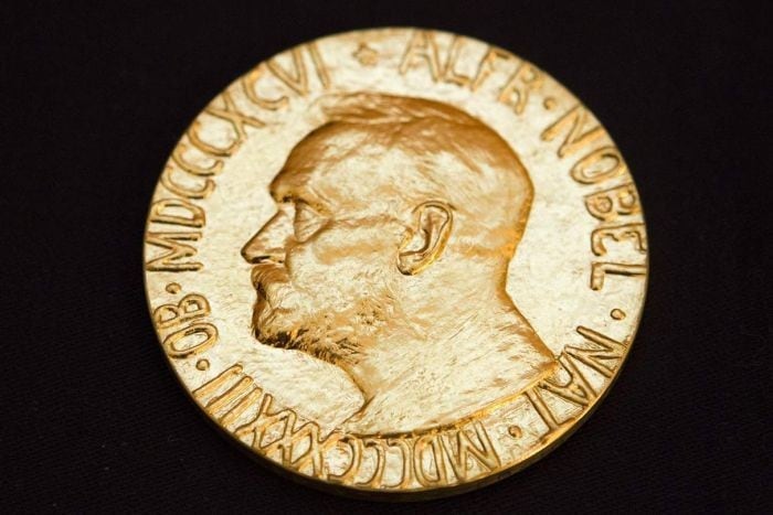 A gold Nobel Prize medallion