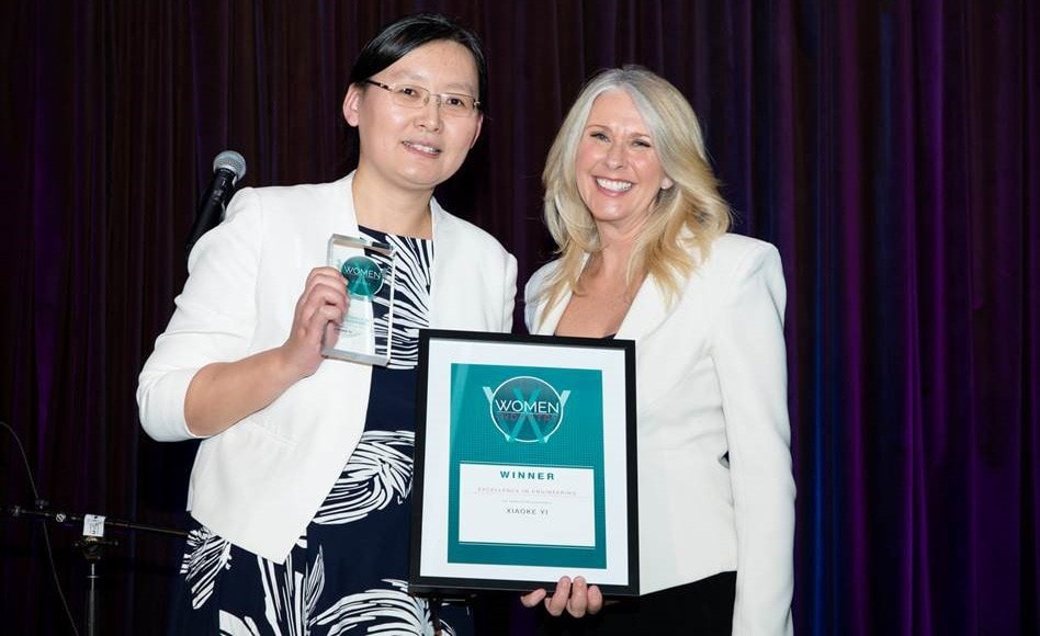 Professor Xiakoe Yi with Tracey Spicer at the Awards night. 