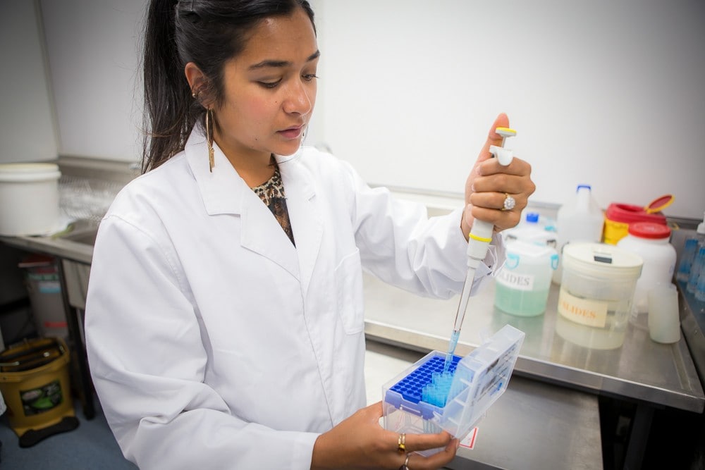 Science graduate Dharmica Mistry in the lab