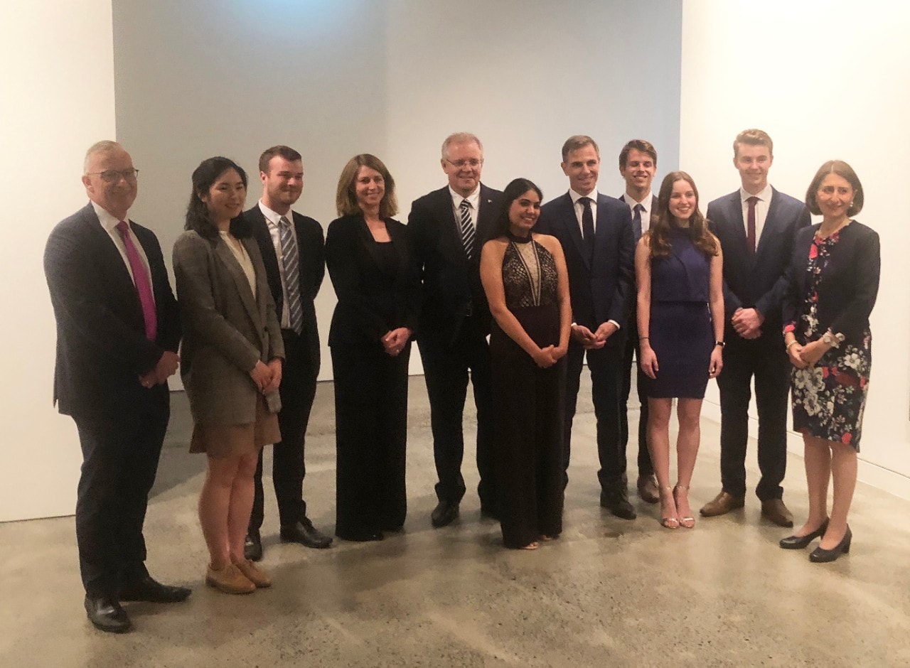Vice-Chancellor Dr Michael Spence, Prime Minister Scott Morrison, NSW Premier Gladys Berejiklian, Lendlease Australian Property CEO Kylie Rampa and Daily Telegraph Editor Ben English with the finalists of the Lendlease Bradfield Urbanisation Scholarship.