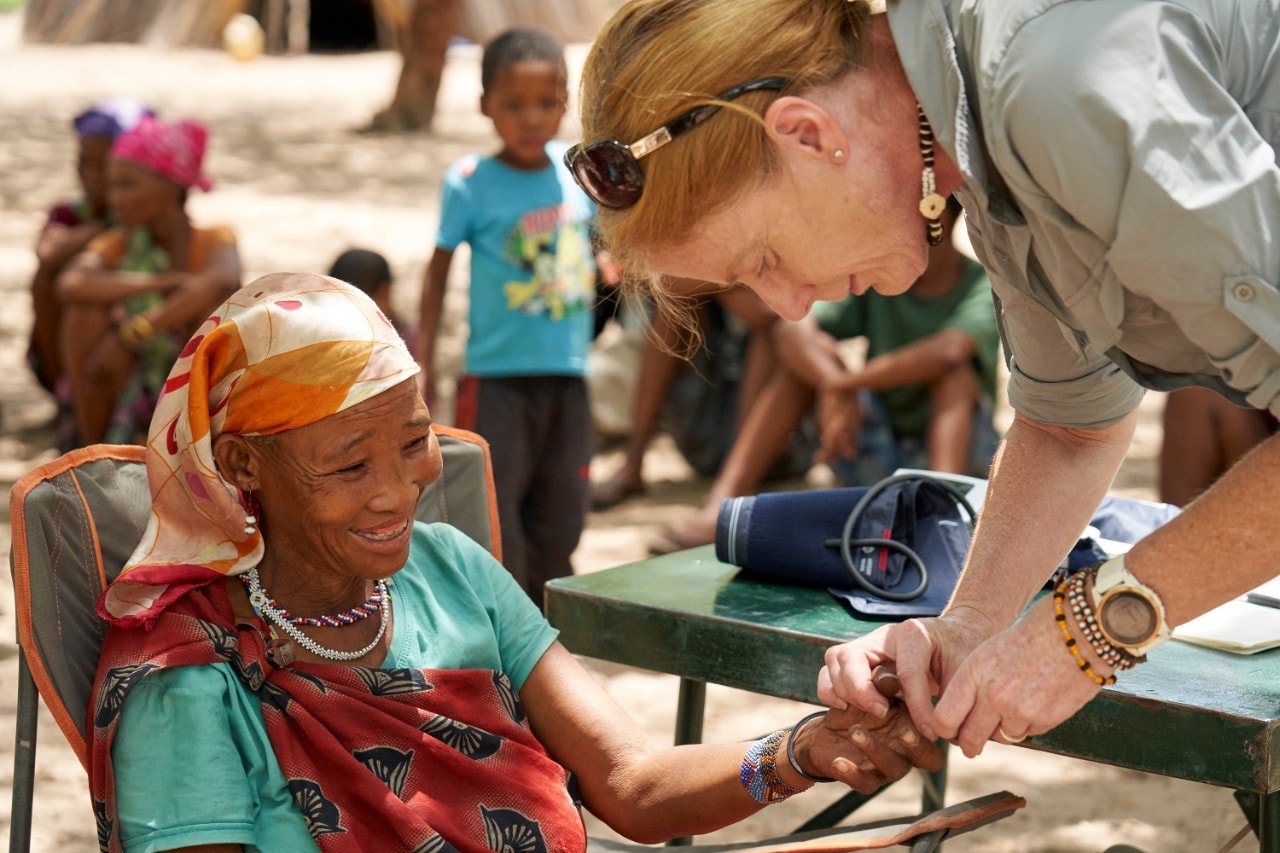 Photograph of Professor Vanessa Hayes taking a blood sample in Namibia.