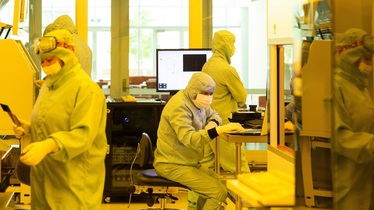 Technicians at work inside the Sydney Nanoscience Hub cleanroom.