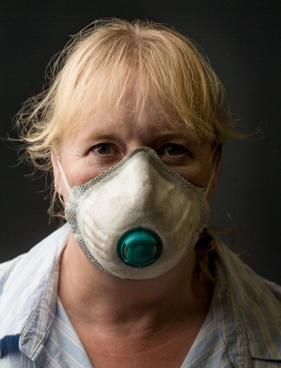 Dr Constance Lord wearing a dust mask