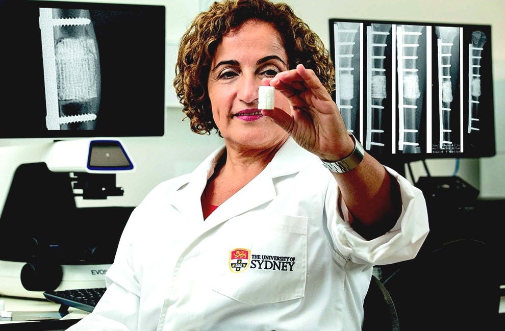 Professor Hala Zreiqat with a sample of the 3D-printed bone.