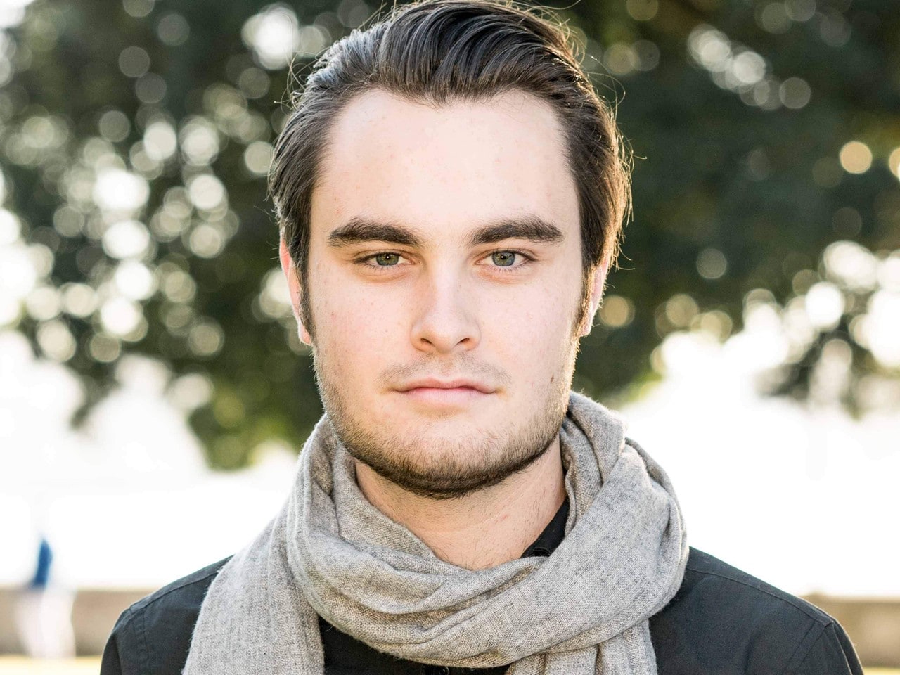 Male musician with scarf 
