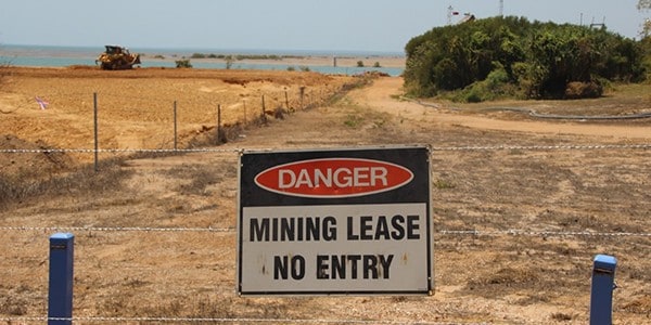 Photo of a sign that says: Danger, mining lease, no entry