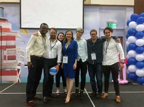 James Dong (Economics/Law), third from right, pictured with the winning team