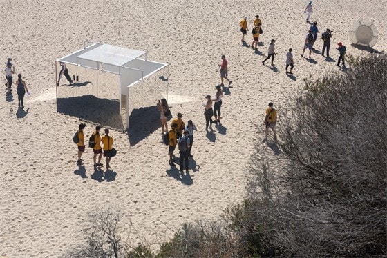 Sophie Lanigan and Isobel Lord’s pavilion, 'Temple', on the beach surrounded by crowds at Sculptures by the Sea