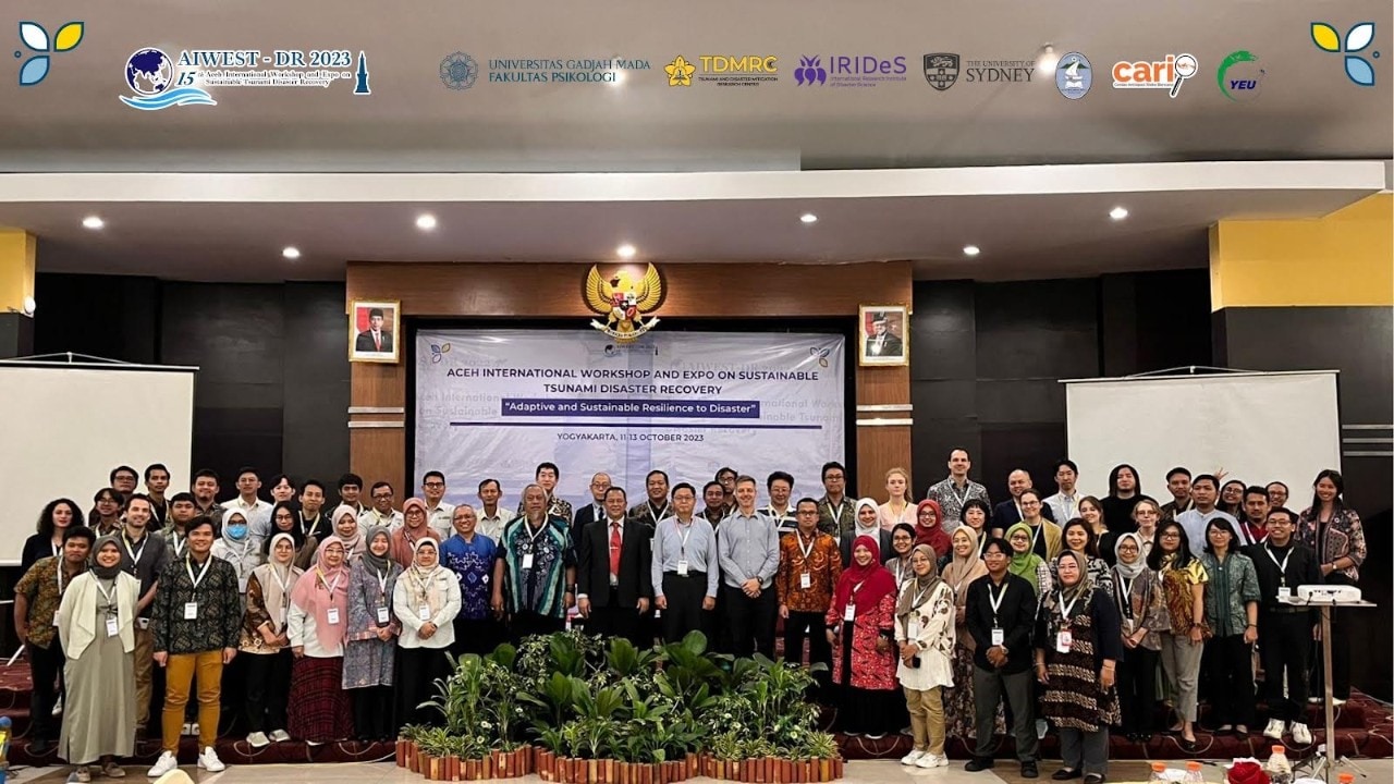 Group photo of conference participants at the 15th Aceh International Workshop and Expo on Sustainable Tsunami Disaster Recovery, hosted by Universitas Gadjah Mada in Yogyakarta, Indonesia.