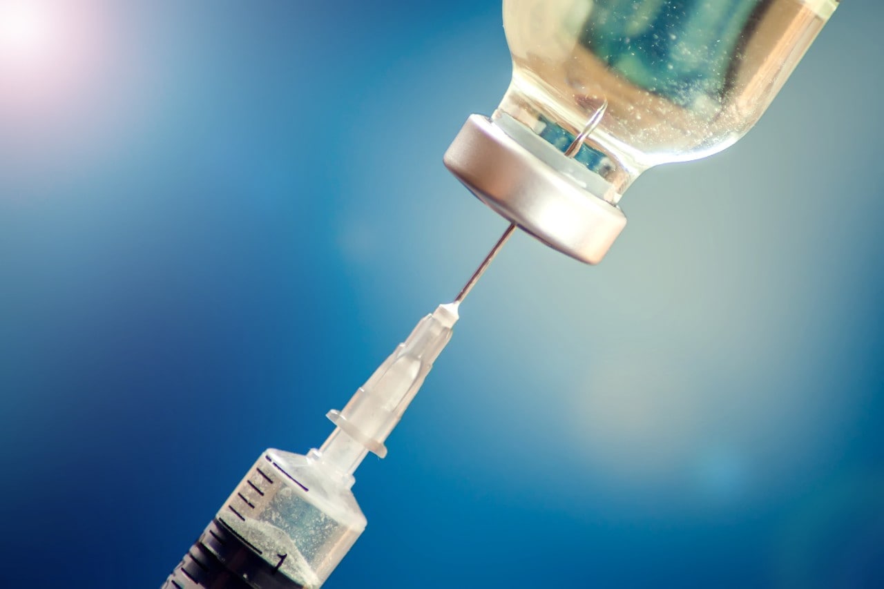 syringe and vaccine bottle