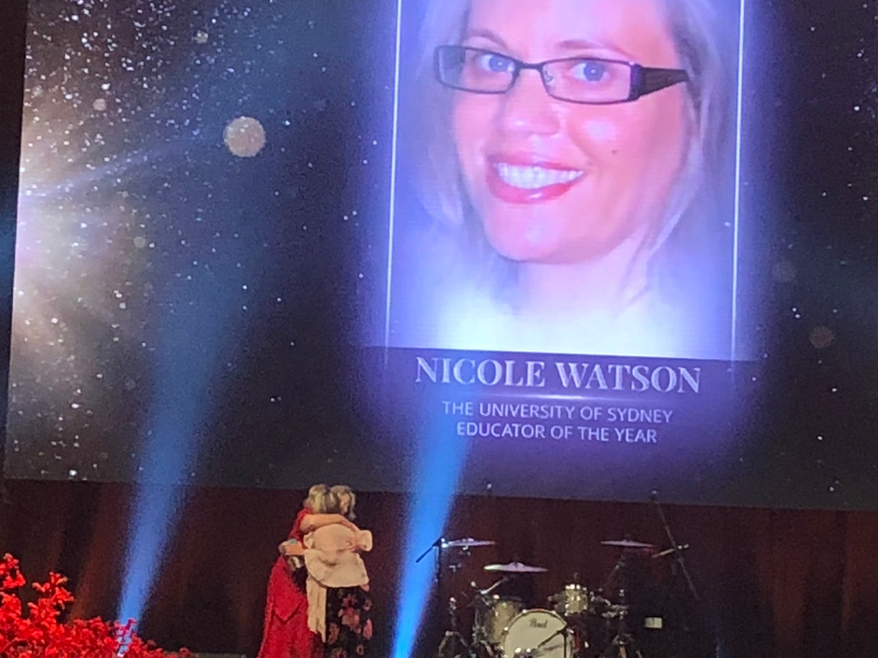 Dr Nicole Watson receives her award from Professor Juanita Sherwood, Associate Dean (Indigenous Strategy & Services) in the Faculty of Medicine and Health