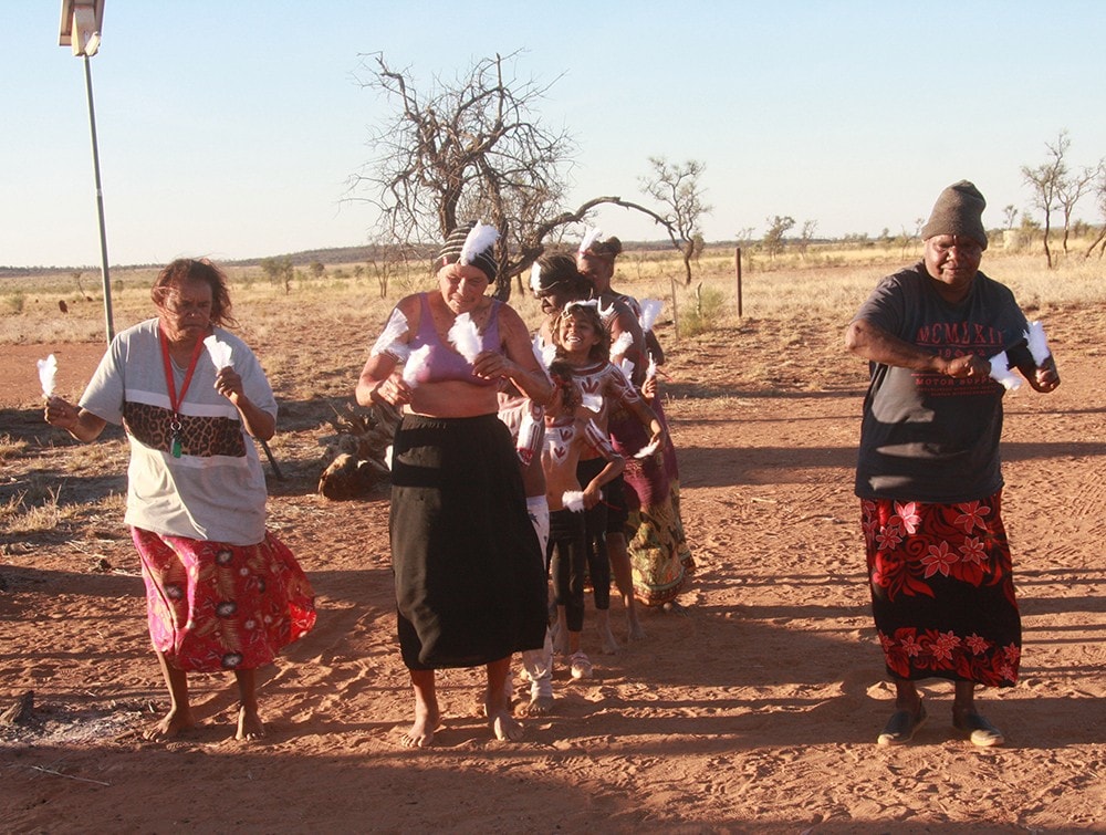 Warpiri women and girls practicing traditional dance