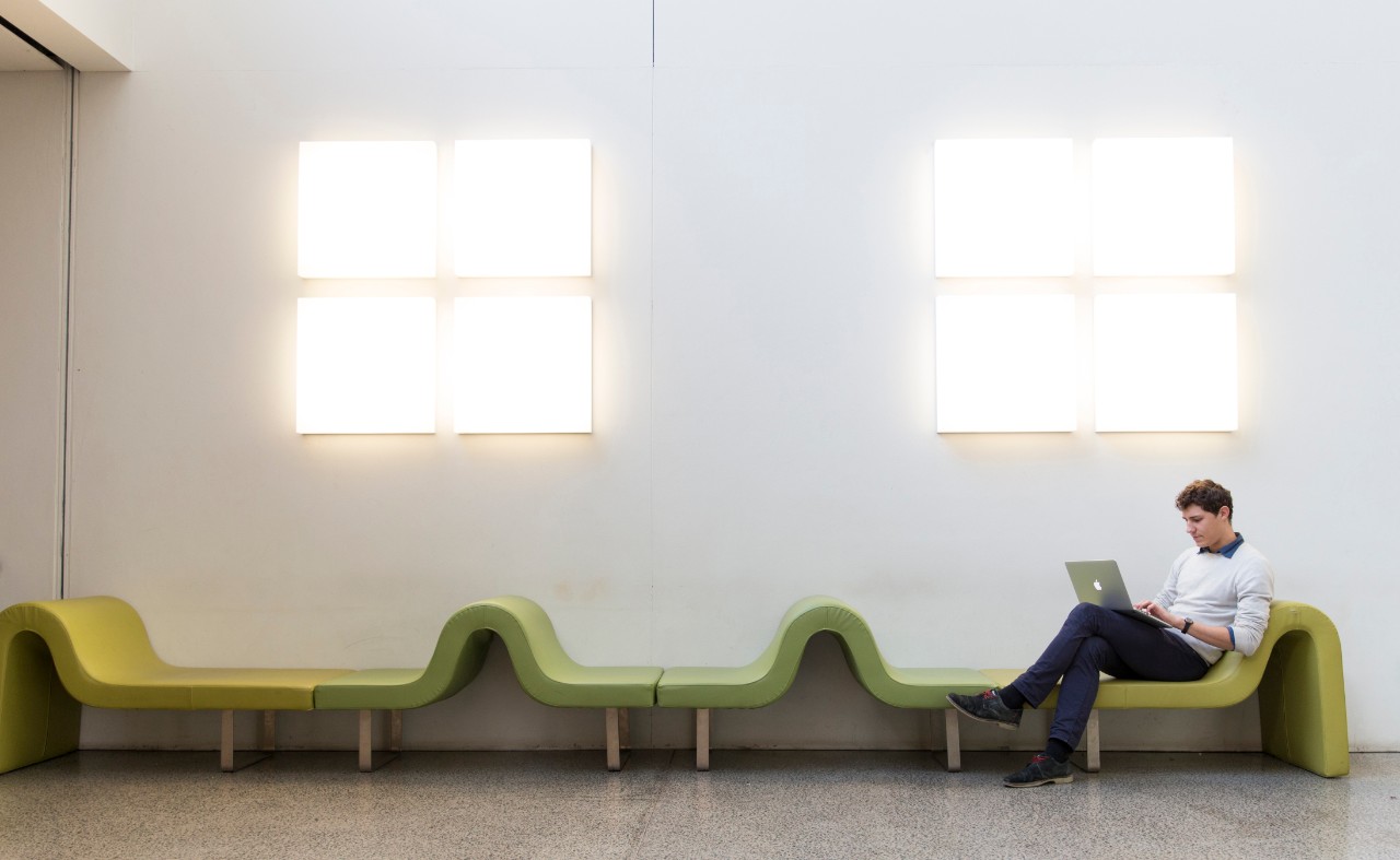 Student working on a latpop
