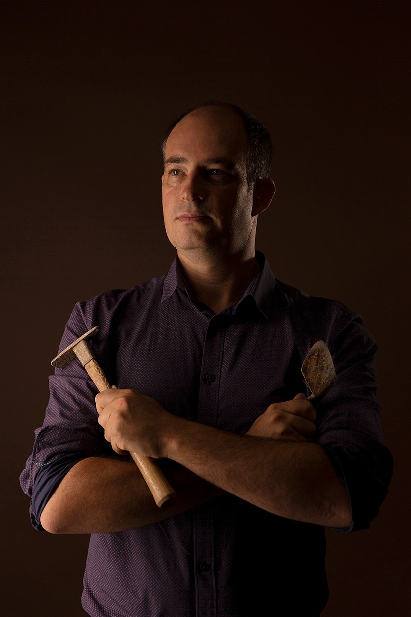 James Fraser with archaeological tools. 
