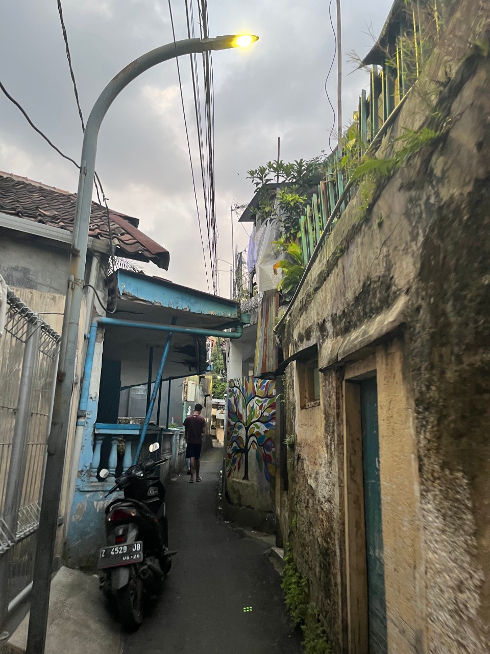 A motorbike in a narrow laneway in Bandung, Indonesia
