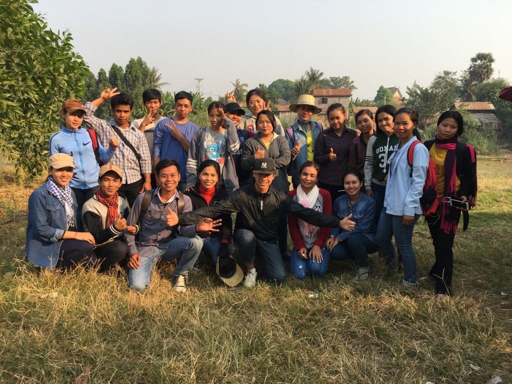 Junjian Zhang (centre) led the social network survey in the field and collected data from over 120 farmers. Credit: Junjian Zhang