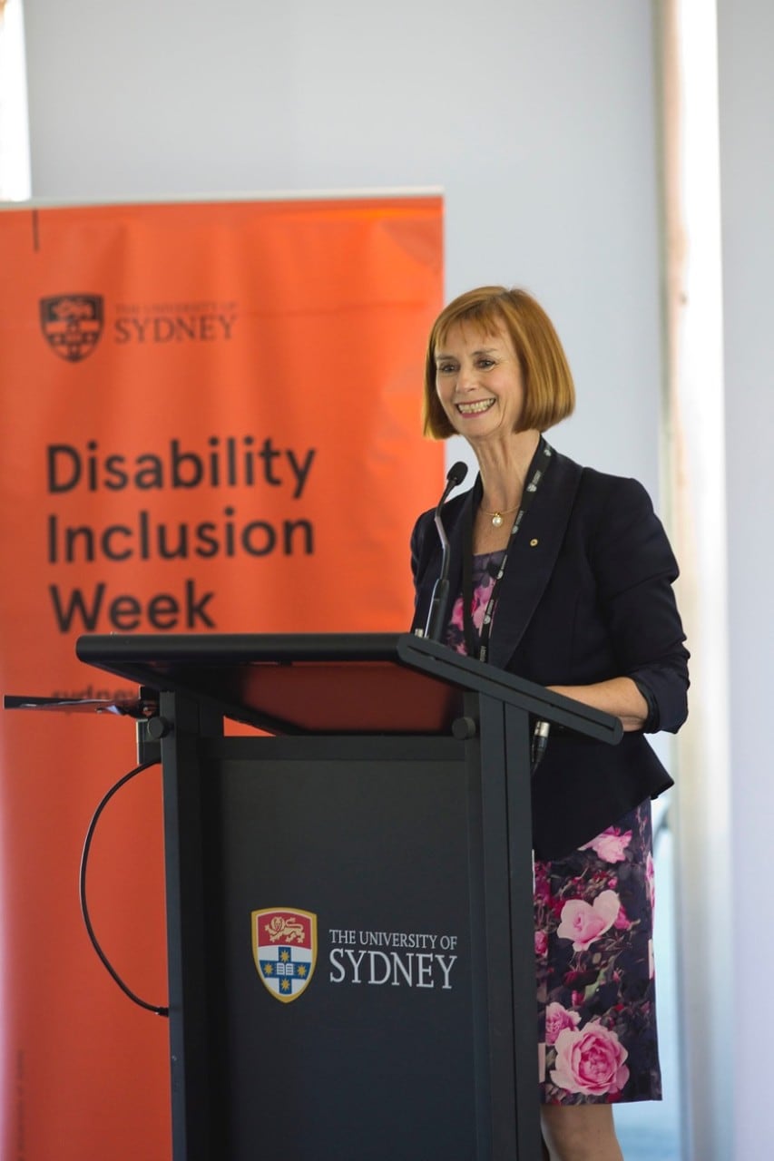 Jennie Brand-Miller, Professor of human nutrition stands proudly facing the audience at disability inclusion week
