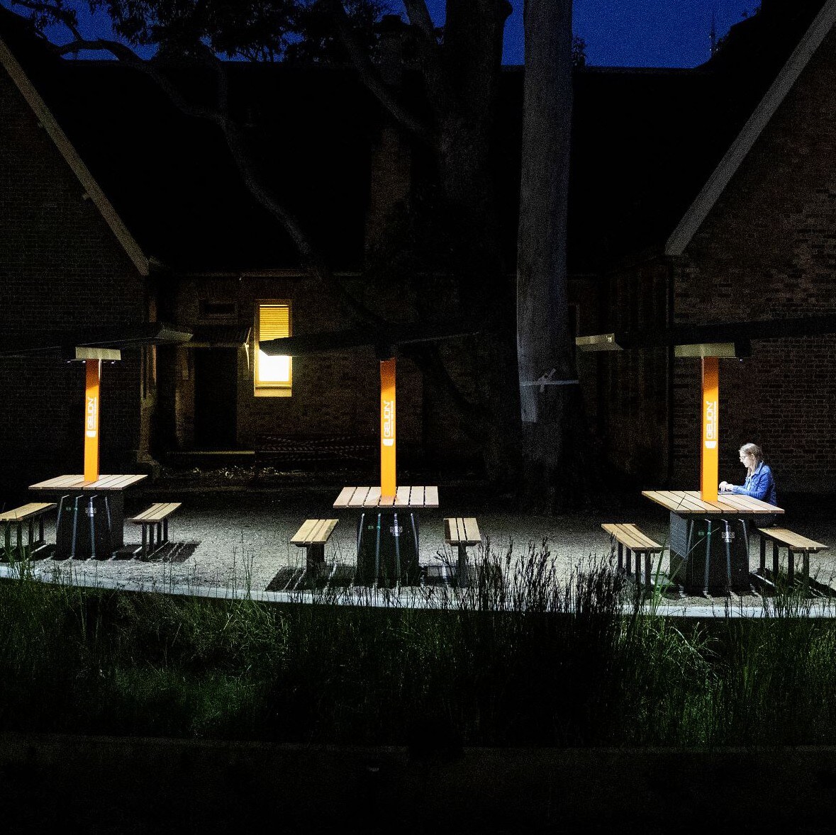 Gelion Solar Smart Benches at night