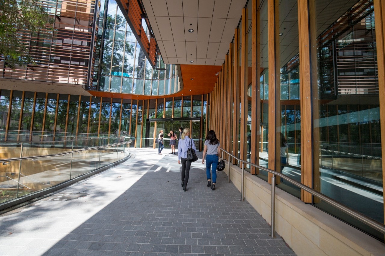 Students walk into the Abercrombie Business School at the University of Sydney's Camperdown/Darlington campus.