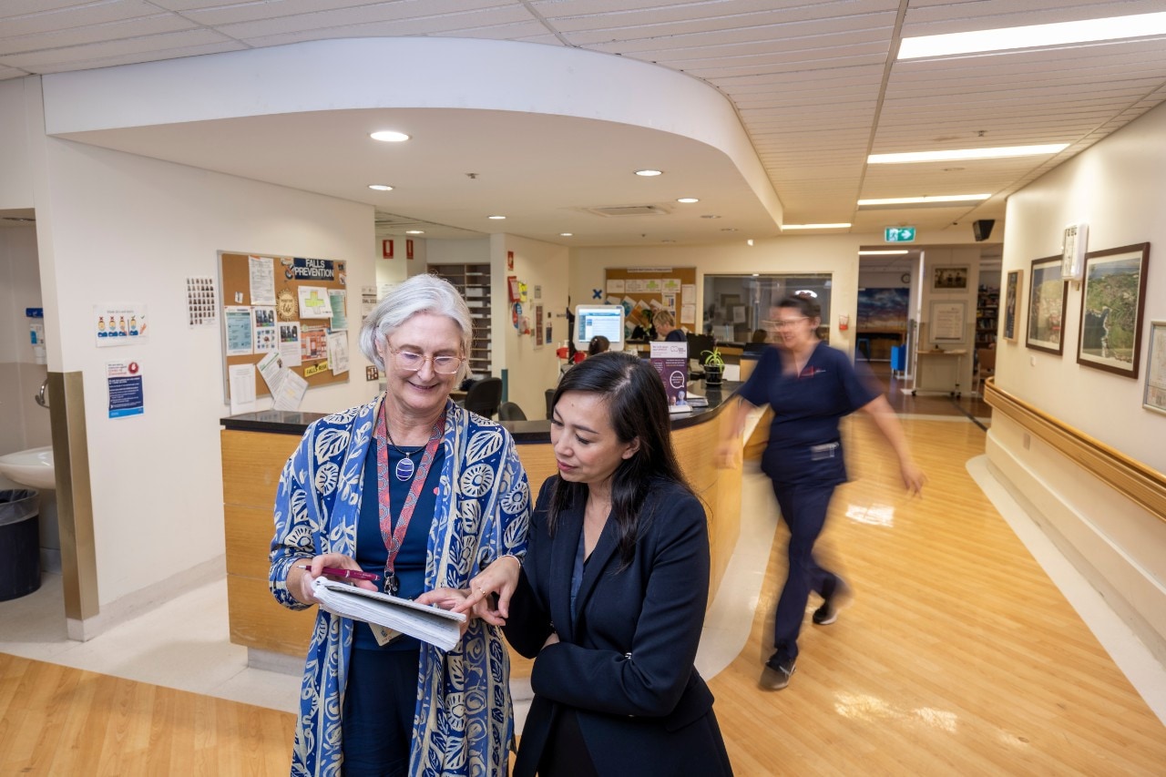 Anya Johnson and Helena Nguyen undertaking research in hospital setting
