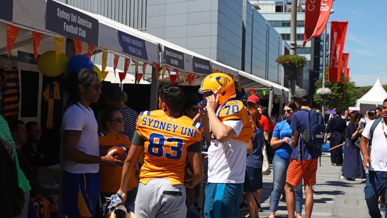 Two students in Sydney Uni NFL outfits