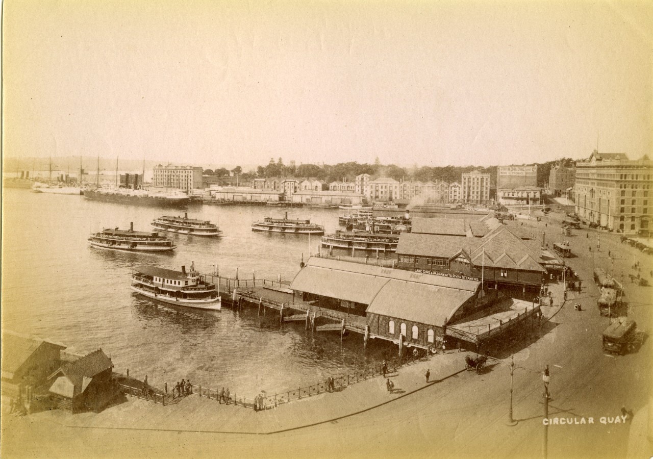 A sepia toned black and white photograph of Circular Quay, taken from a point of elevation.
